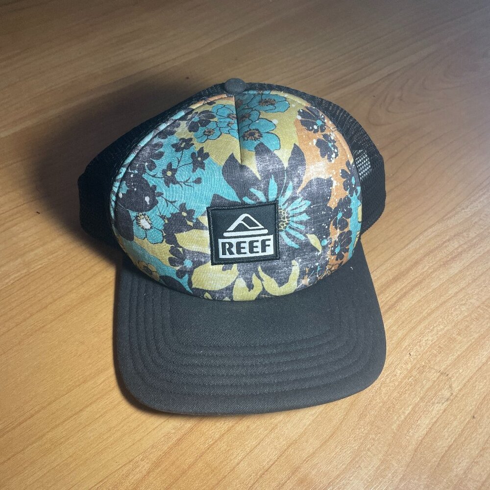 Black Reef trucker hat with floral design